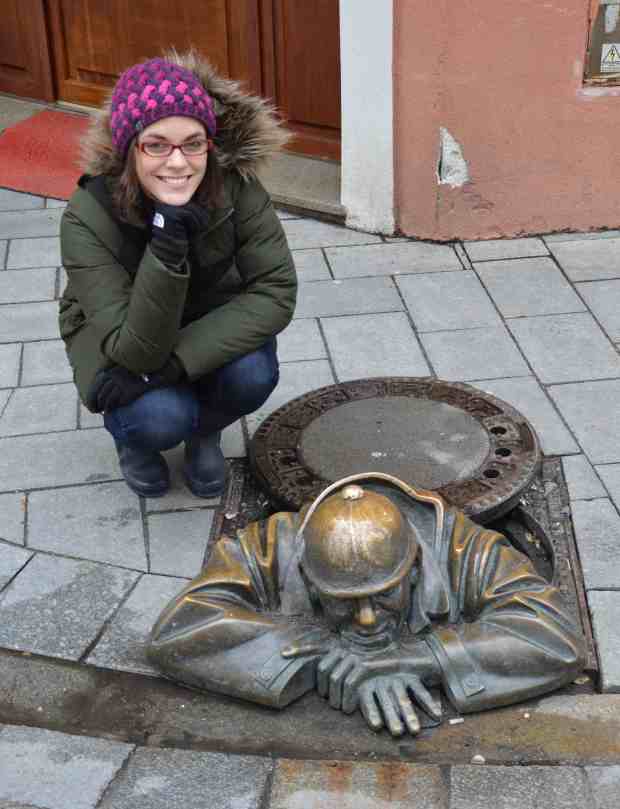 Rubberneck. According to Bratislava's tourist website: "A unique Bratislava curiosity: no other city in the world has a statue emerging from a manhole. After Rubberneck had lost his head twice due to careless drivers city councillors decided to help him by erecting a road sign to warn drivers: another world-first..." (Source: http://visit.bratislava.sk/en/vismo/dokumenty2.asp?id_org=700014&id=1225&p1=3993). 